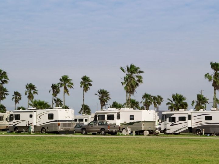 Variety of RV types including motorhomes, fifth wheels, and camper vans serviced in Houston